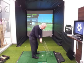 Golfer and Optishot Golf Simulator in action